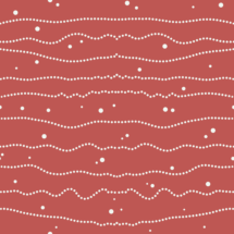strings of pearl garlands and snow flakes on red background 